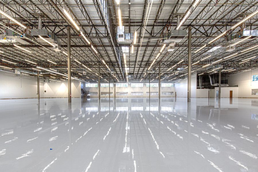 Large concrete floor area inside a high-performance industrial or data center facility